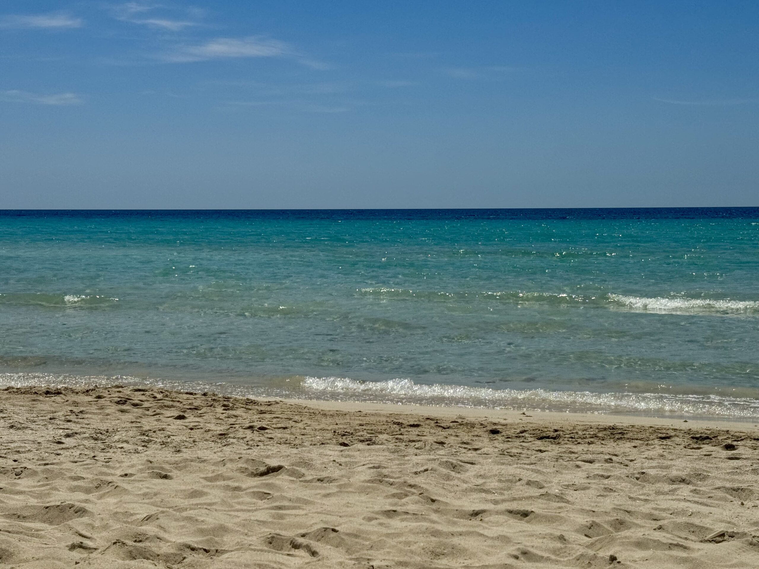 Torre Lapillo sandy beach and clear waters. Where to stay in Salento