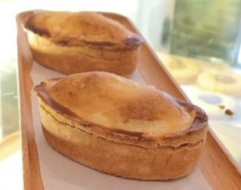 Two Pasticciotto Leccese pastries, typical breakfast in Puglia